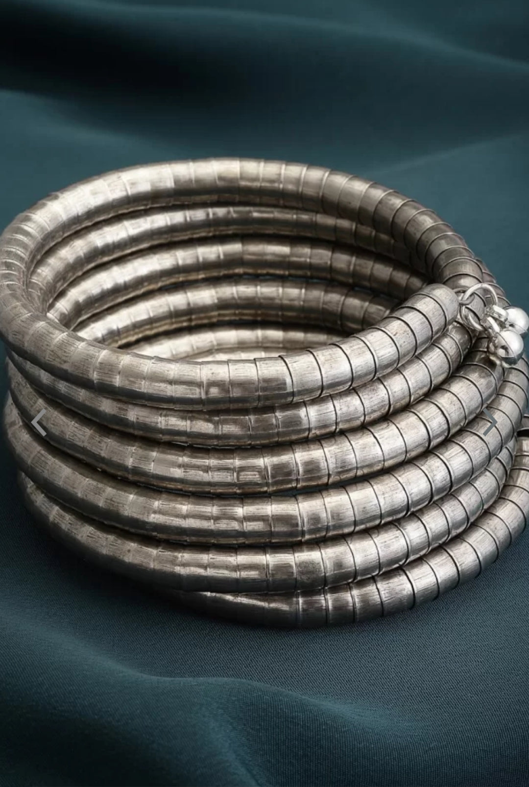 Spiral silver bangles 